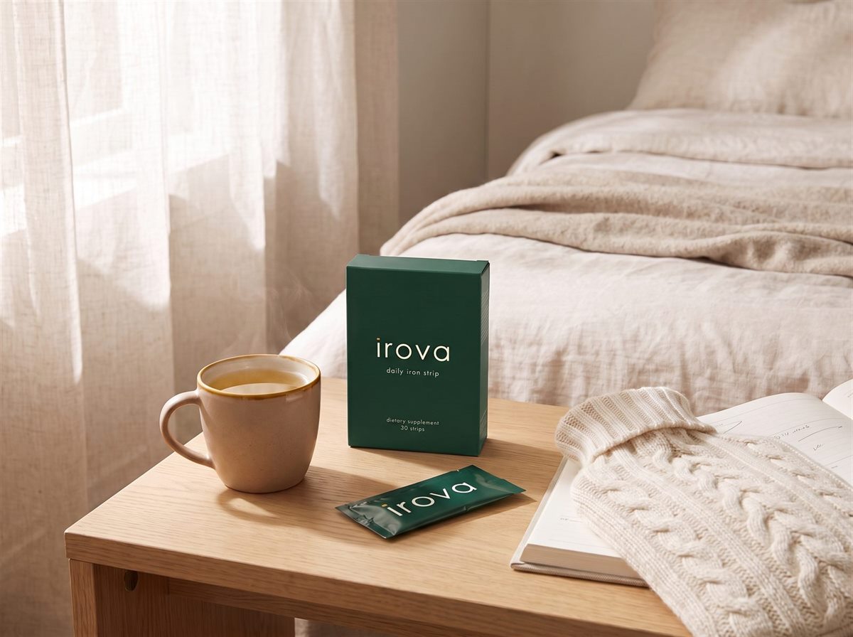 Irova box and a sachet on a bedside table next to a mug of tea
