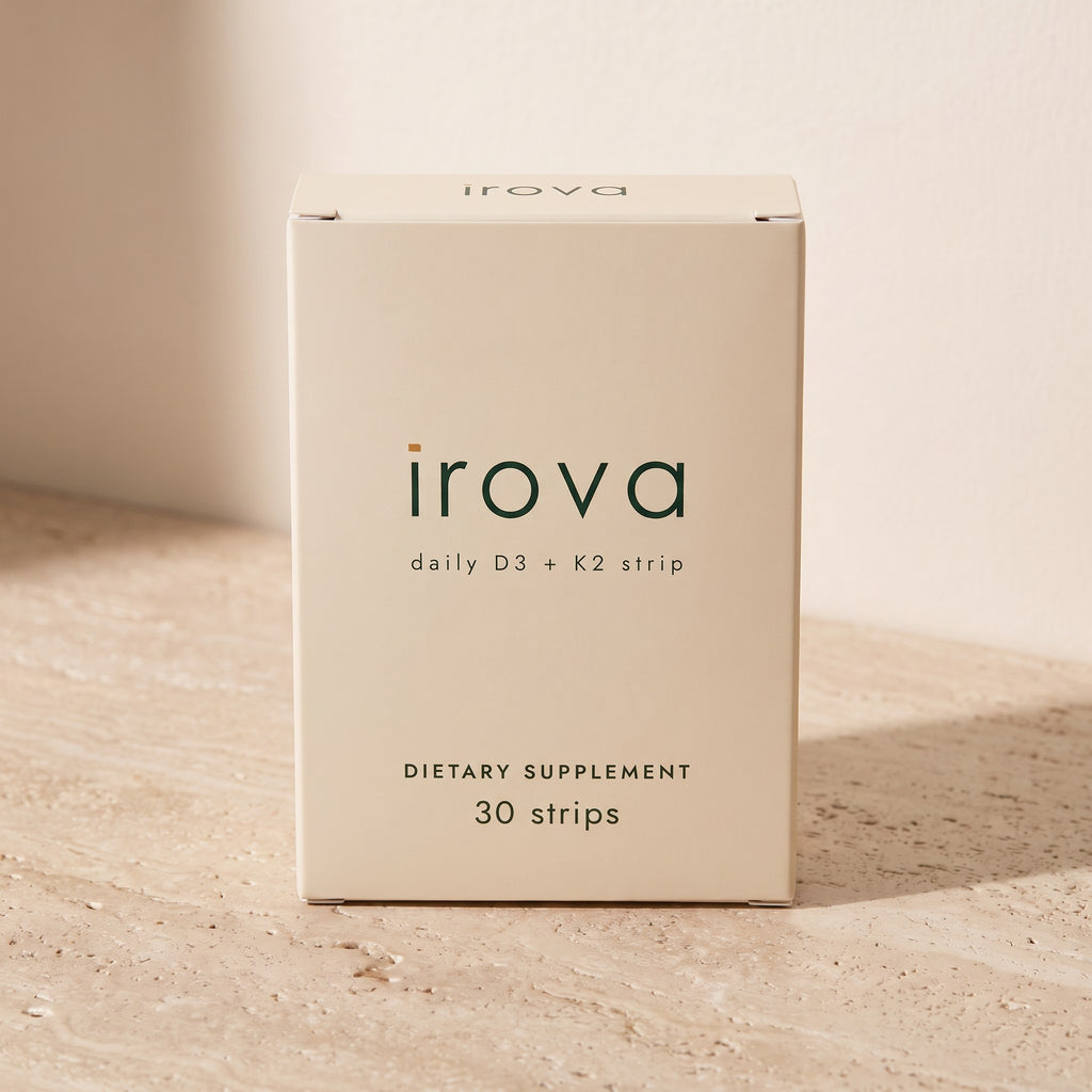 Irova Daily D3 + K2 Strips box, 30 strips, on a travertine shelf in morning light