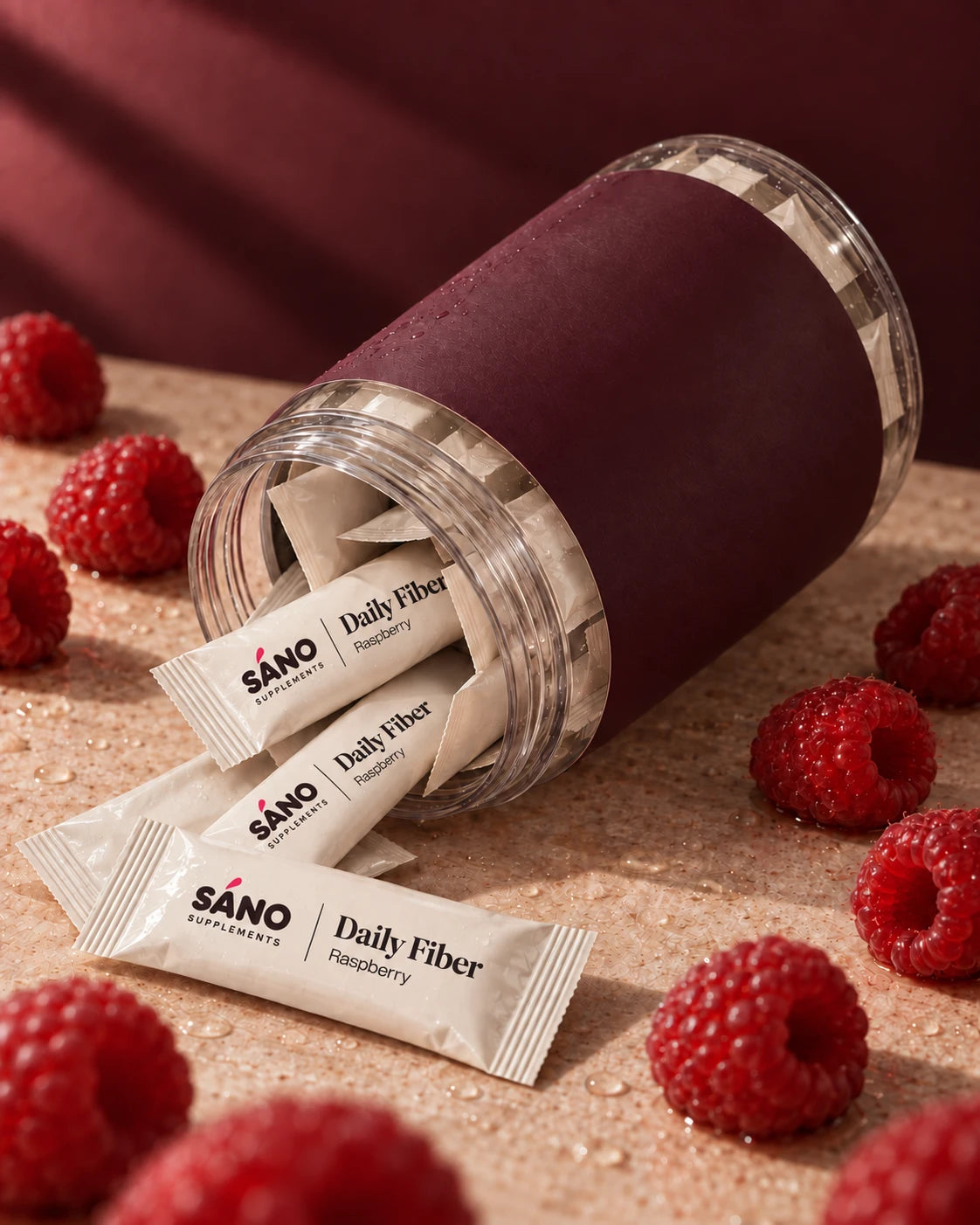 The Sáno jar on its side with daily sachets spilling out